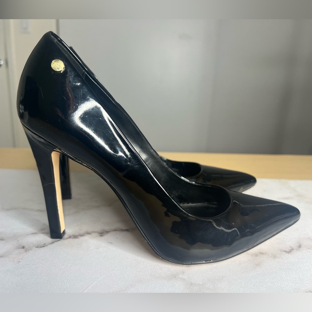 Calvin Klein pointy toe stiletto pumps.